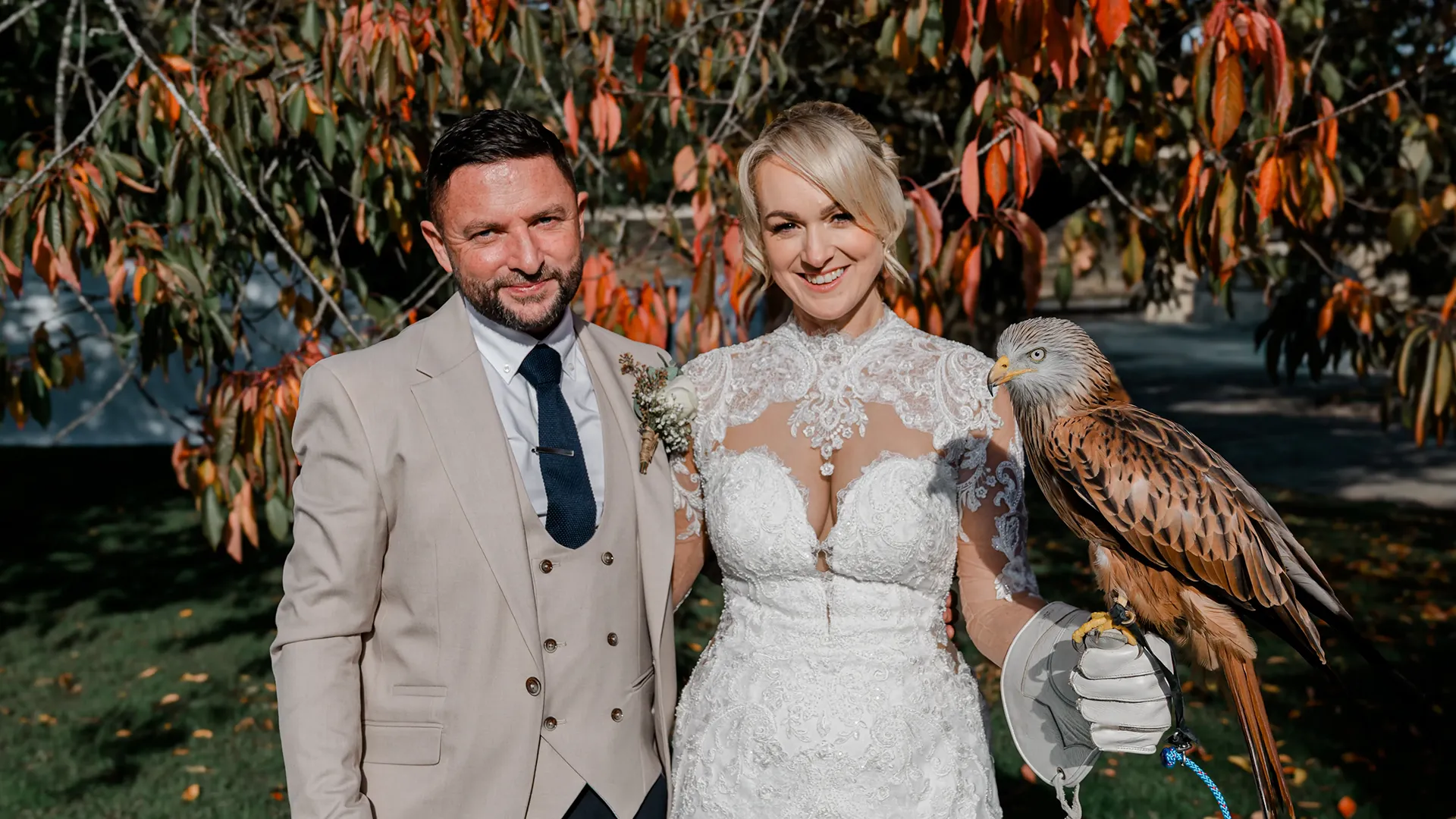 Bride and Groom holding a Red Kite - Photo by Tigra Woods Photography